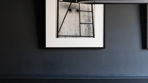 Dining room with panelled walls painted in Farrow & Ball Railings