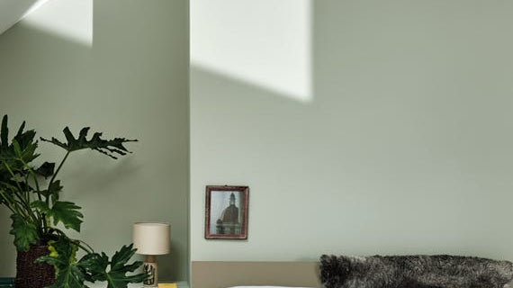 Small attic bedroom painted in Farrow & Ball Mizzle
