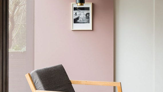 Sitting room with walls painted in Farrow & Ball Sulking Room Pink
