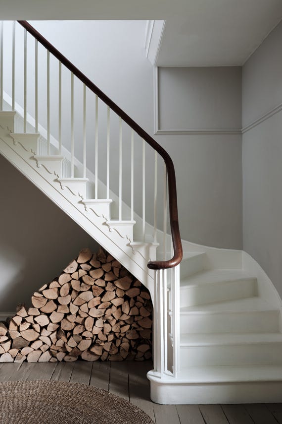Hallway and staircase painted in Farrow & Ball Cornforth White