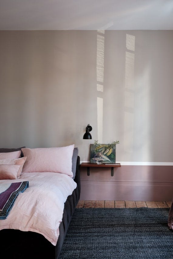 Warm grey bedroom walls painted in Farrow & Ball Elephant's Breath
