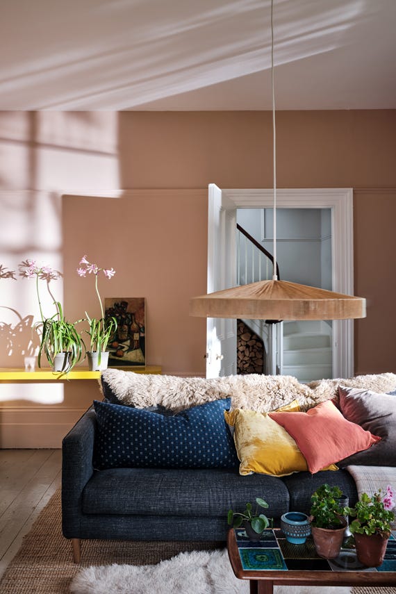 Living room with warm pink walls painted in Farrow & Ball Setting Plaster