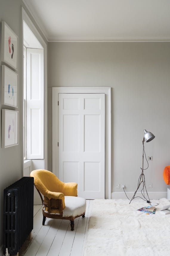 Calm room with walls painted in Farrow & Ball Skimming Stone