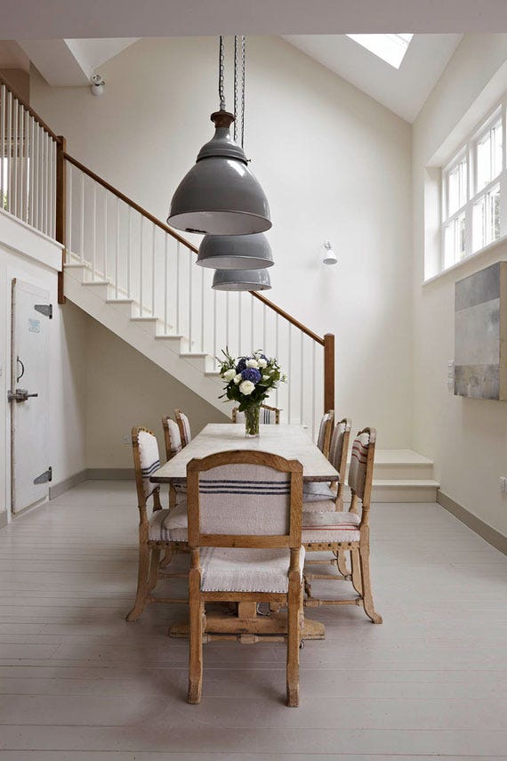 Hallway and dining area painted in Farrow & Ball Slipper Satin