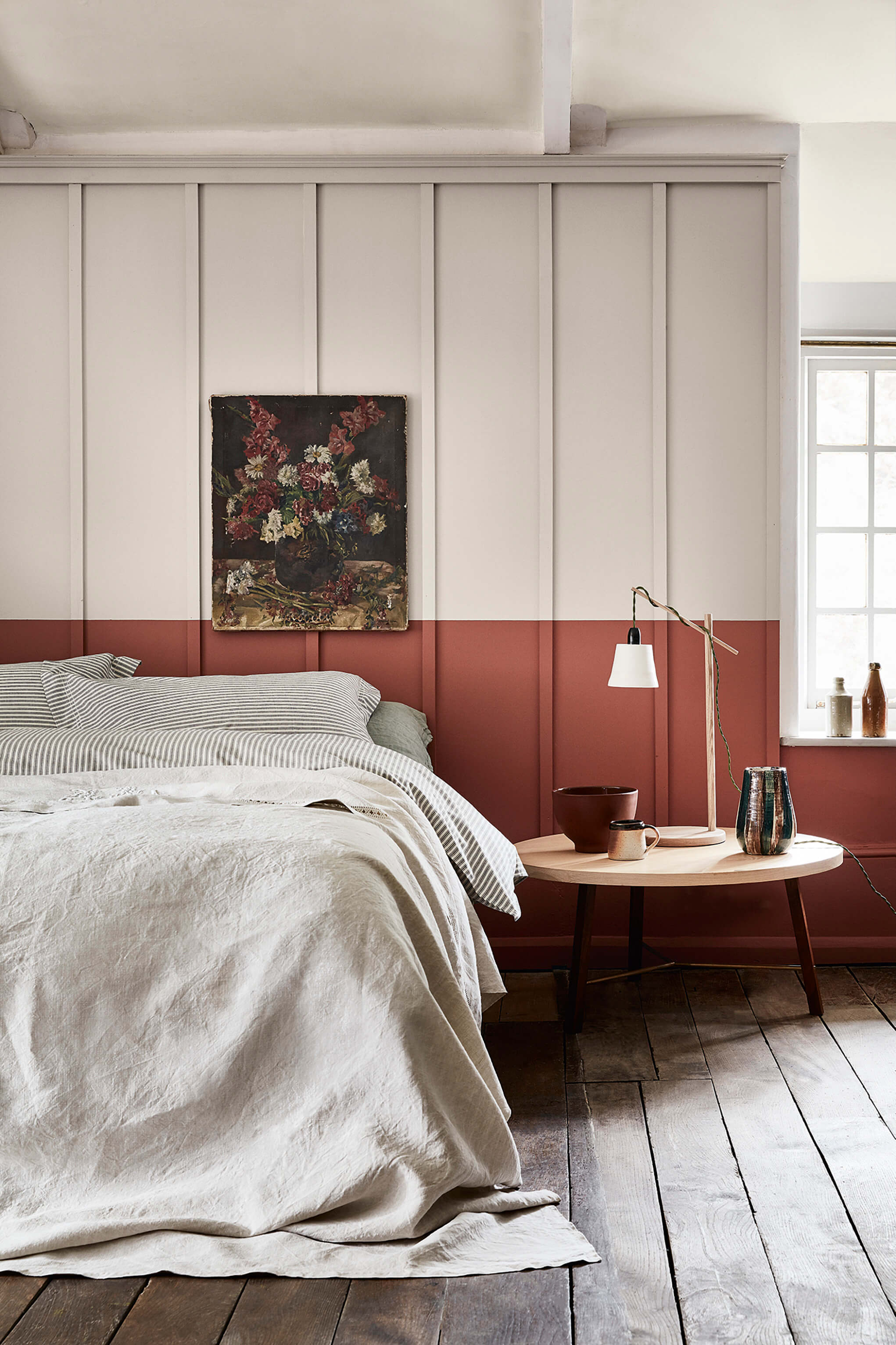 Bedroom painted in Little Greene French Grey with Tuscan Red
